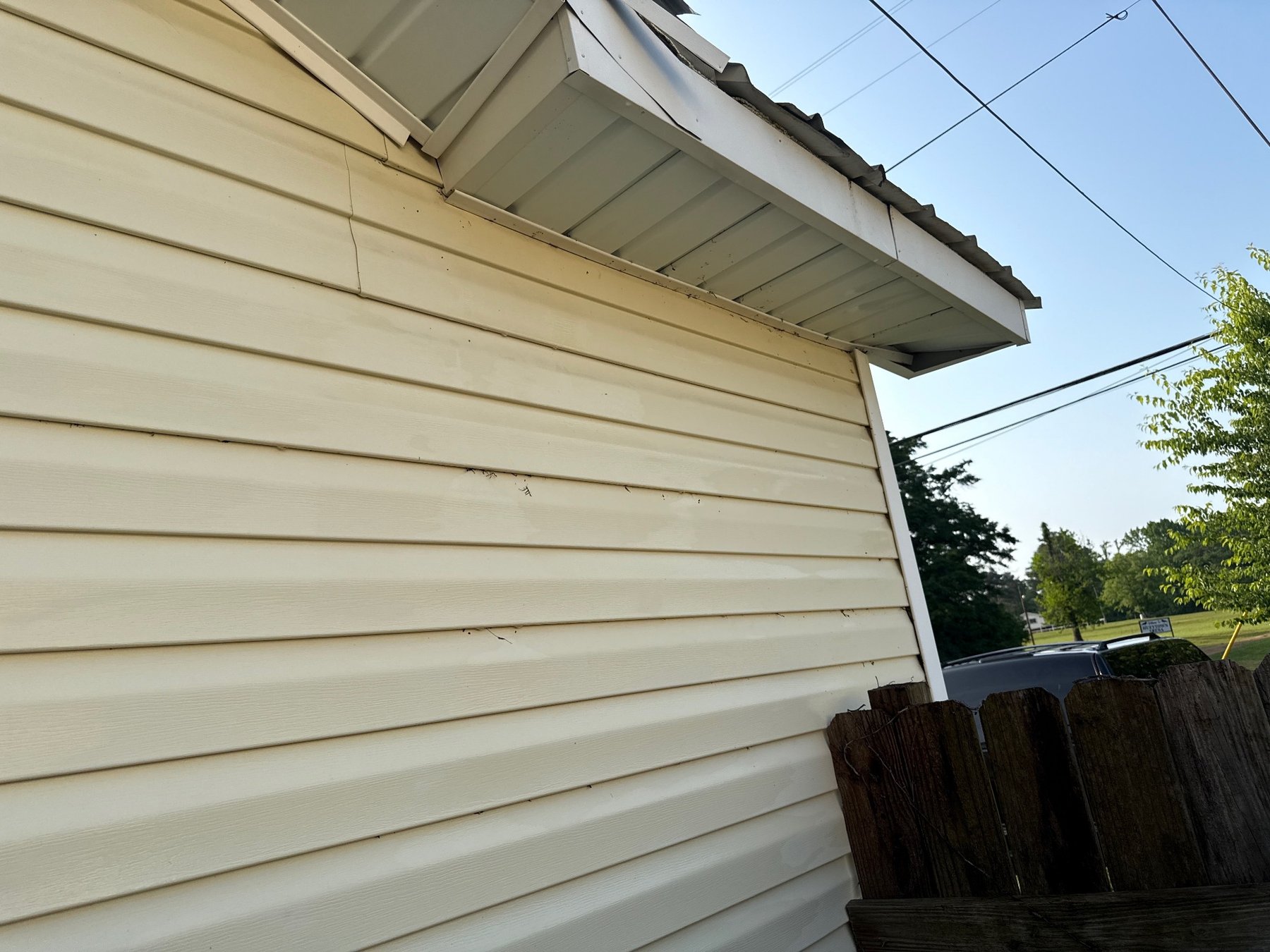 After - Side siding cleaned and rinsed after exterior washing