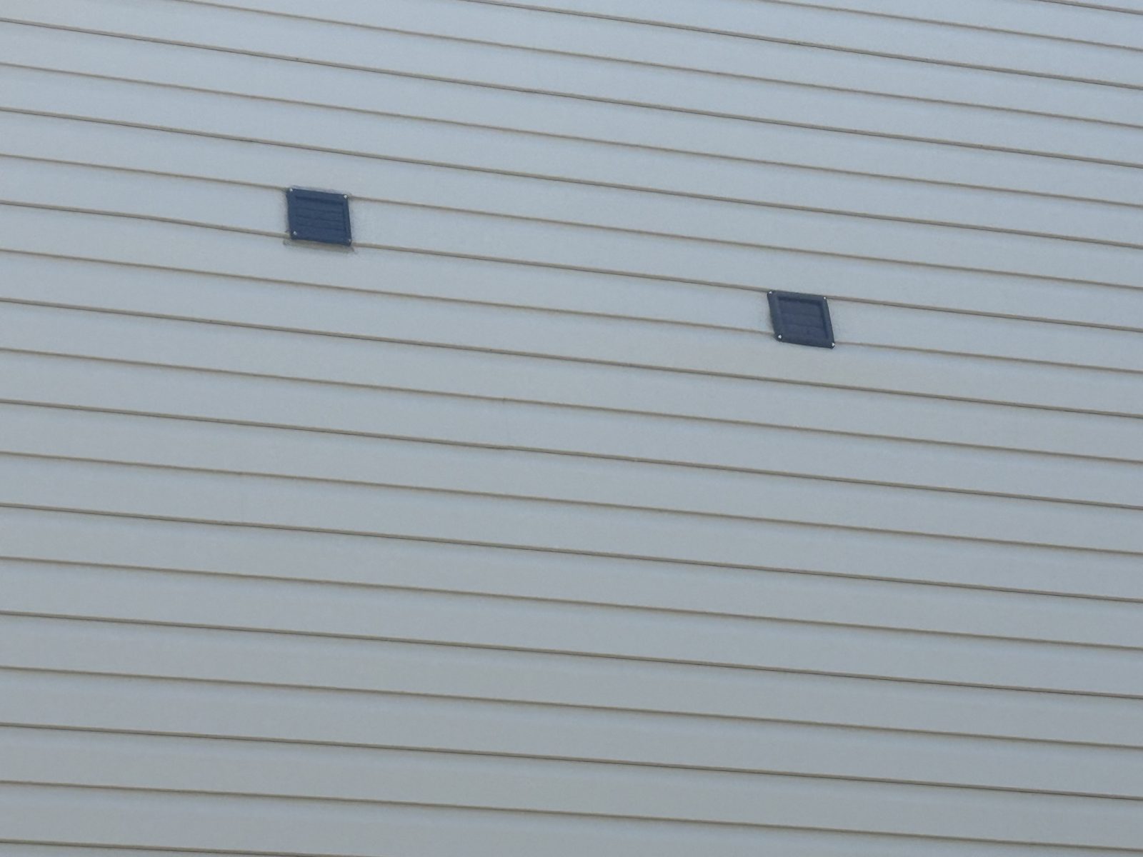 After - Clean siding with vents cleared of all mold and mildew staining